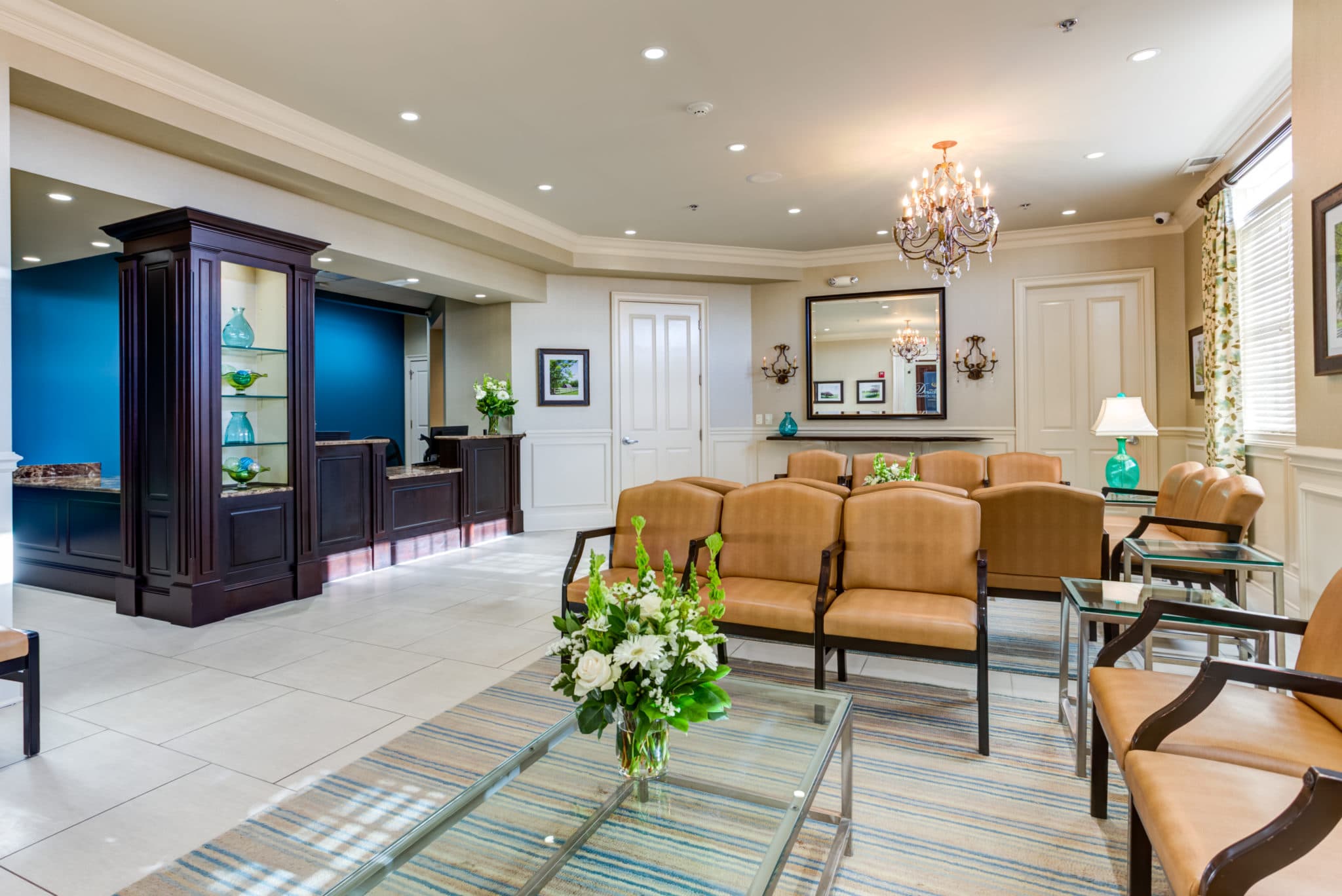 Barrington location waiting area, chairs, desk, chandelier