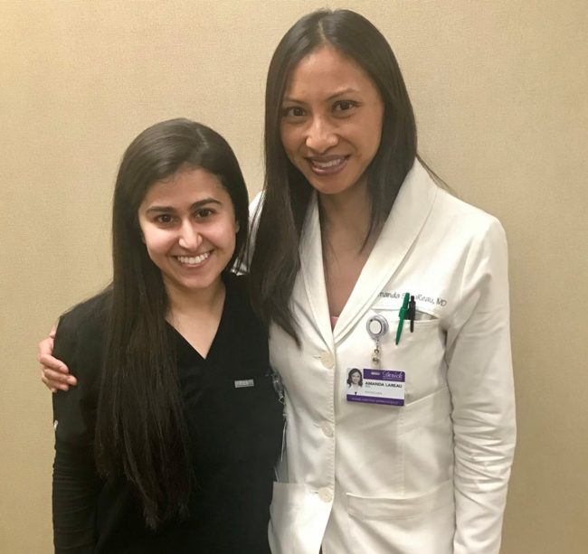 Picture of Dr. LaReau and Nena celebrating a great review