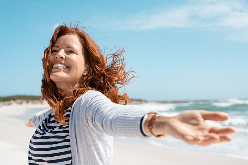 Carefree woman on beach
